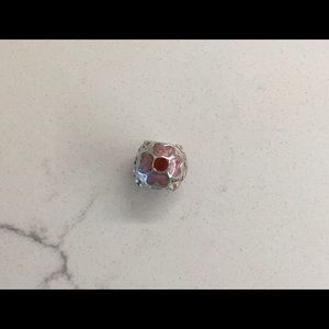 Authentic Pandora pink/red flower charm.